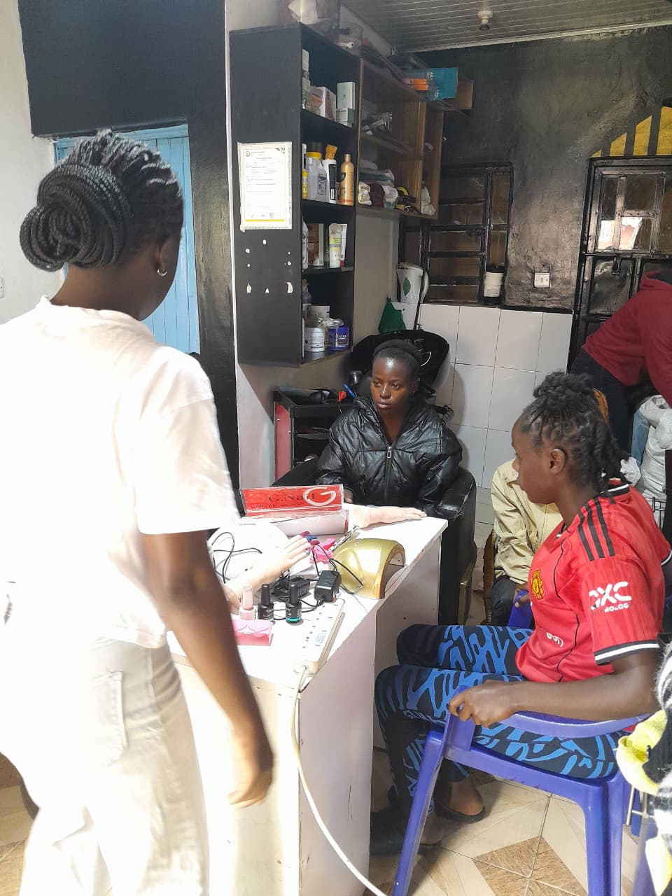 One-on-one coaching at the nail desk